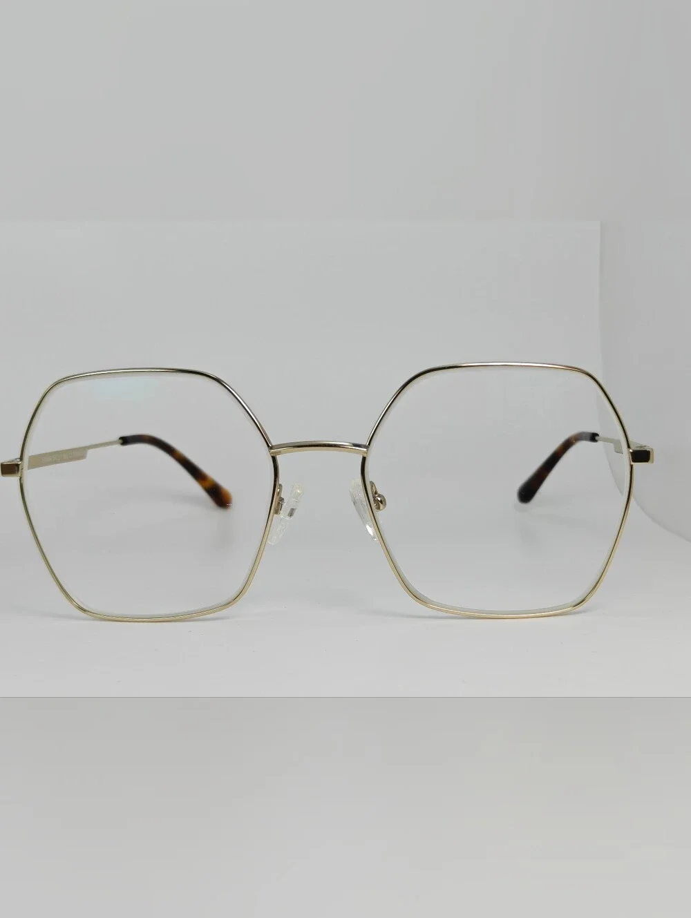 Elixir. Titanium.Gold Polygon. Metal Frame Women's Eyewear.